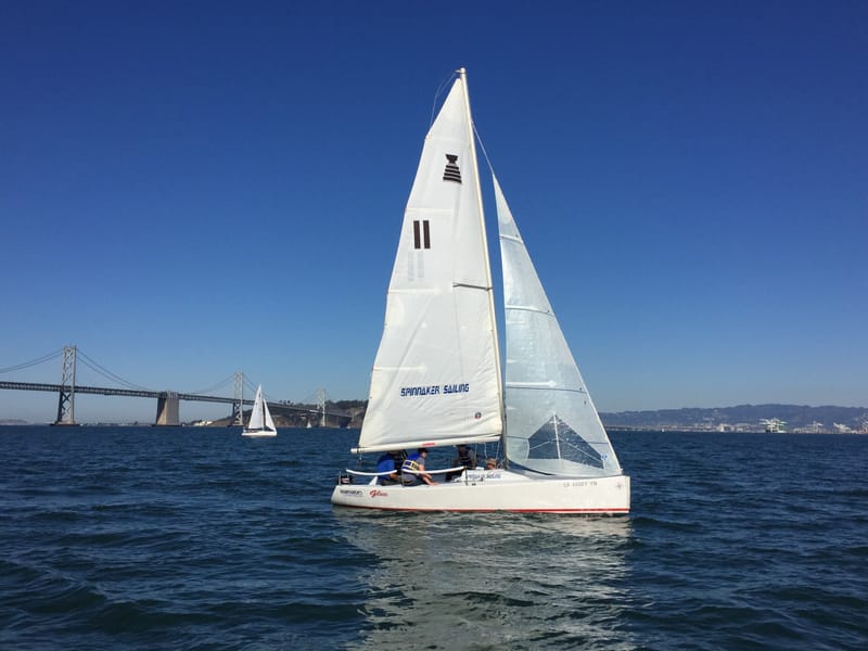 An Andrews 21 sailing with the Bay Bridge behind