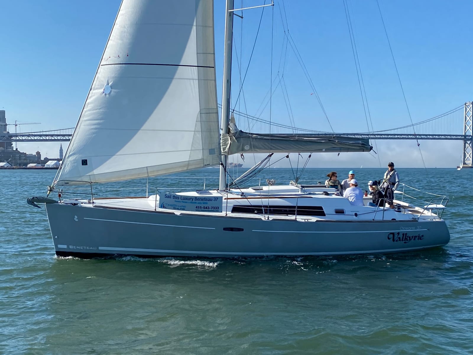 The Beneteau 37 Valkyrie sailing near the Bay Bridge