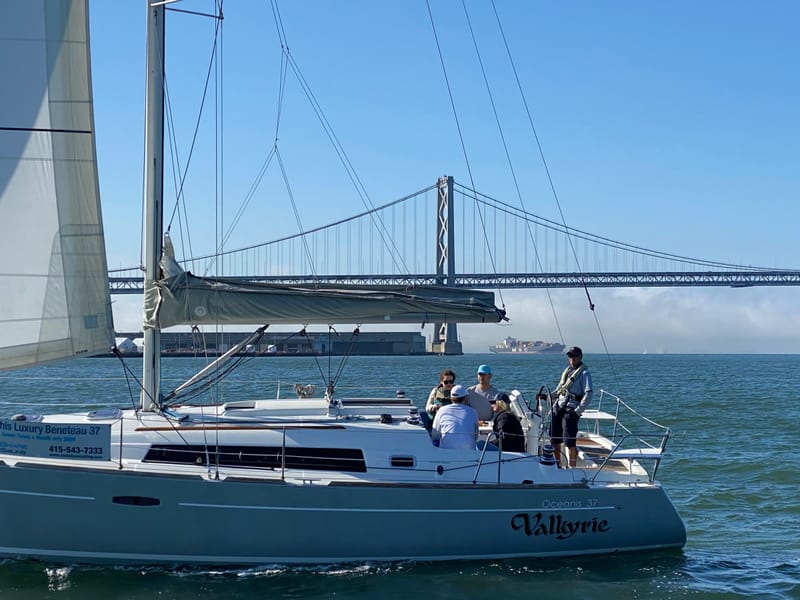 Valkyrie under sail with the Bay Bridge behind