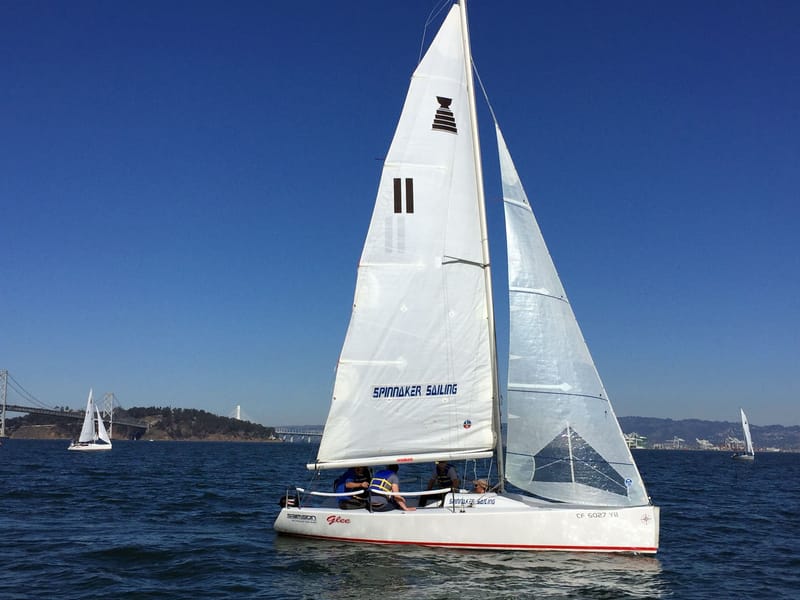 An Andrews 21 sailing on the Bay with the Bay Bridge behind