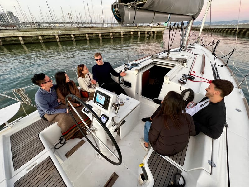 Gerhard and friends in the cockpit of the Beneteau 37 Valkyrie at the dock